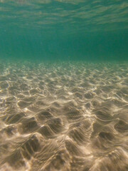 Sand and seabed underwater. Clear water in Lake Superior Michigan