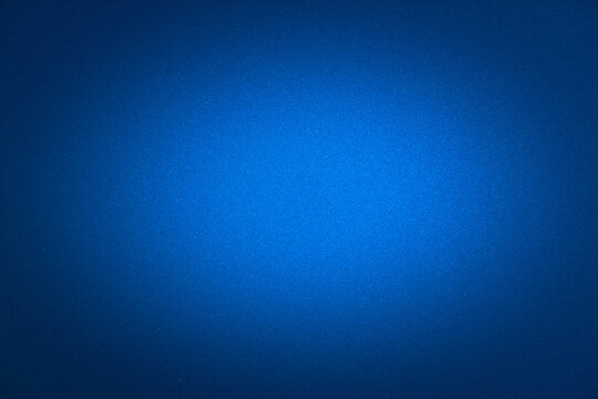 Empty deep blue background with vignette.