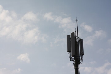 Telephone poles and sky on the street
