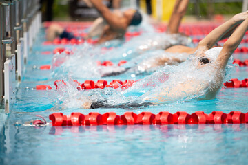 Swimming competition And the boy's arm rotation practice