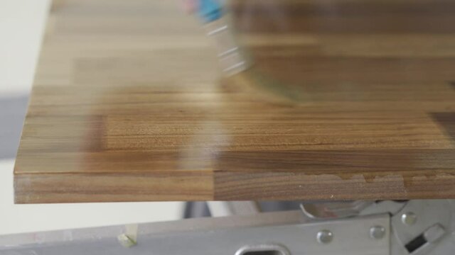 Wood Stainer Applied with Brush Strokes to Panel