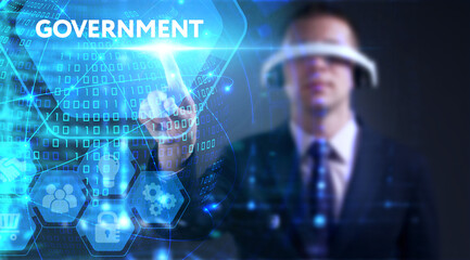 Business, technology, internet and network concept. Young businessman thinks over the steps for successful growth: Government