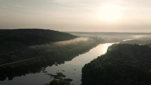 Misty river and landscape of Windsor Quebec Canada during a cold morning -aerial