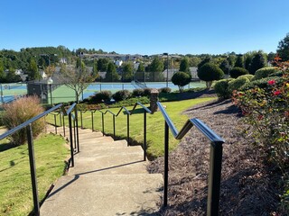 Fototapeta premium the stairs leading down the tennis court