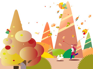 色づく秋の林を走る女性と犬