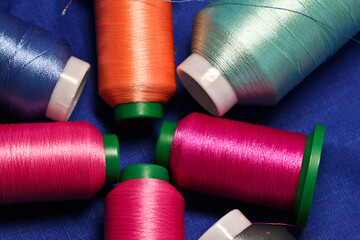 bobbins of polyester thread for embroidery.