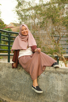 Fashion portrait of young beautiful asian muslim woman with wearing hijab.