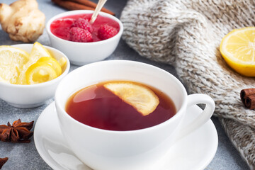 Lemon raspberry jam hot tea. Warming products for the prevention of colds and flu. Copy space.