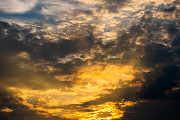 colorful dramatic sky with cloud at sunset.