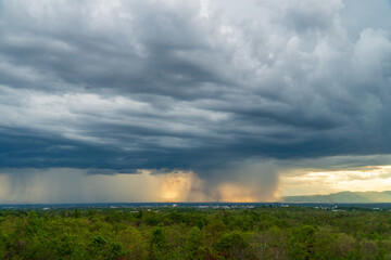 Obraz na płótnie Canvas Storm clouds with the rain. Nature Environment Dark huge cloud sky black stormy cloud.