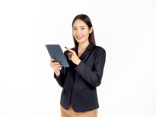 Fototapeta premium Portrait of young beauty Asian Businesswoman in black suit holding and using tablet.