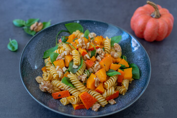 home made autumn pasta with pumpkin, walnuts and chestnuts