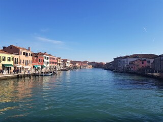 View of Murano (Venice) from a bridge over the river. Murano (Venice) architecture.