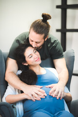 Pregnancy woman and handsome husband