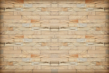 old brown slate wall stone background or texture.