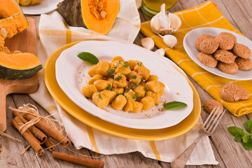 Pumpkin gnocchi with grated amaretti cookies.