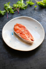 salmon fish raw red steak fillet seafood serving size copy space for text diet pescetarian food background rustic