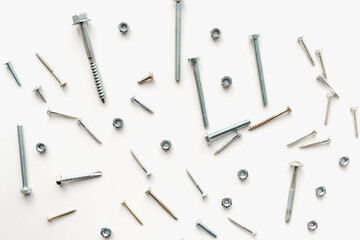 bolts with nuts on a white background, bolts and nuts