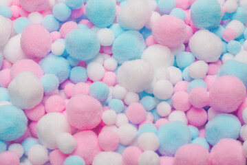 White, pink and blue soft pompons.