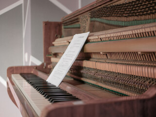 full length wooden piano