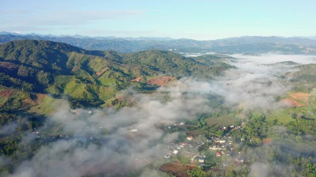 Panoramic view in the Constanza valley, Dominican Republic, clouds between the mountains, a clear day