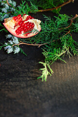 pomegranate red fruit ripe sweet on the table new year tasty treat christmas serving size top view copy space for text food background rustic