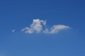 Beautiful cloudscape of nature single white cloud only one on blue sky background in daytime