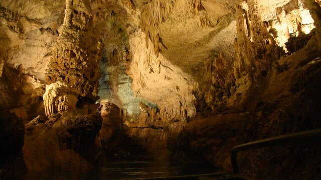 Cave, Underground river, Sail in a boat on an underground river, river in a cave, large cave with an underwater river, staloctites, stalogmites