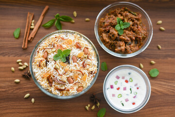 beef or Mutton or lamb biryani. Spicy Indian Malabar biryani or Hydrabadi biryani, Dum Biriyani,  fish and rice. pulao basmati rice, spicy mixed rice dish with meat curry for Ramadan Kareem, Eid