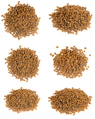 Food for animals isolated white background. Dry cat and dog food texture. Pet meal background close up