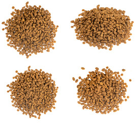 Food for animals isolated white background. Dry cat and dog food texture. Pet meal background close up