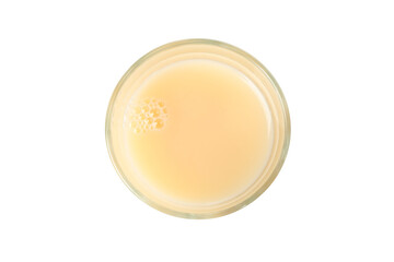 Glass of banana juice isolated on white background