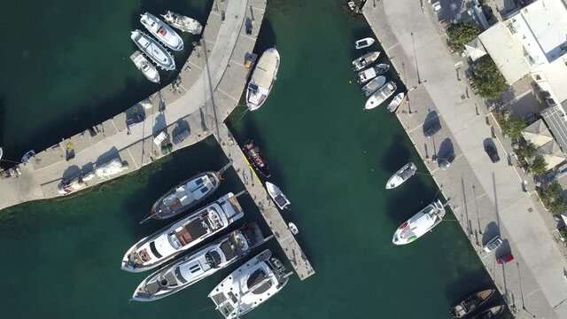 Aerial view of the pier with Paros island on a background Naousa village