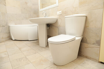 Naklejka na ściany i meble Modern comfortable bathroom in light beige color