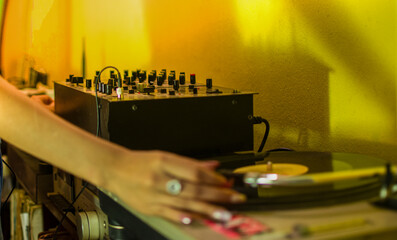 soundboard. Turntable. Dj woman