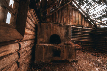 Fototapeta premium Wooden rustic houses in old village. Cloudy autumn day in a countryside mill village.