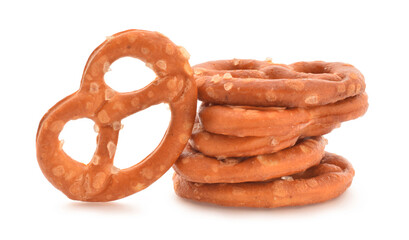 Pretzels salted in stack closed up isolated on white, German specials food.