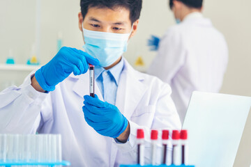 Scientist covid-19 virus chemistry  research experiment biotech antibody sample laboratory...