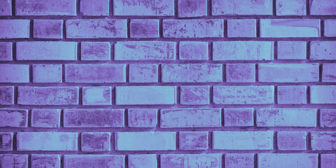 Old brick wall. Neon lighting. Background texture