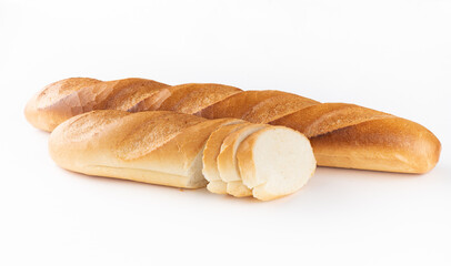  two wheat sliced baguettes on a white background