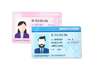 Different driving licenses on white background