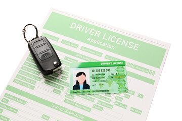 Driving license with application form and car key on white background