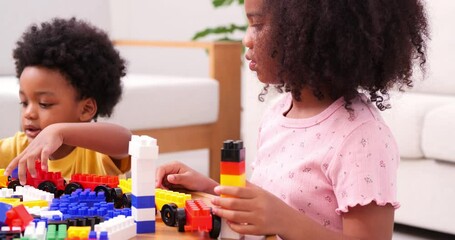 Children playing toy at living room.  Preschool and Education concept. - Powered by Adobe