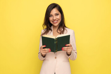 happy brunette businesswoman reading book