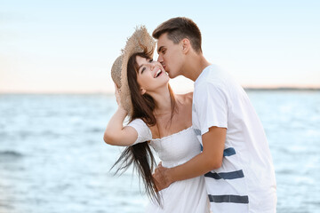 Happy young couple on sea beach