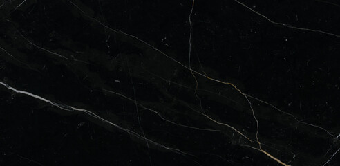 Luxurious black agate marble texture with golden veins, polished marble quartz stone background striped by nature with a unique patterning, natural breccia marble for ceramic wall and floor tiles.