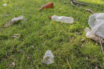 Plastic and other garbage thrown by tourists pollutes parks. Plastic garbage environmental pollution problem. Kartal Eco Park, Orlovka village, Reni raion, Odessa oblast, Ukraine, Eastern Europe