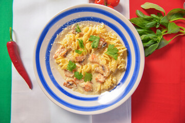 Still life with traditional Italian food on Italian flag. National cuisine concept. Top view, flat lay, menu concept.