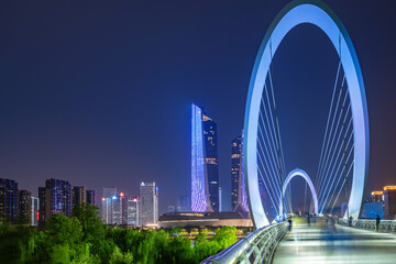 Eye of Nanjing Pedestrian Bridge and urban skyline in Jianye District, Nanjing, China