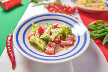 Still life with traditional Italian food on Italian flag. National cuisine concept. Top view, flat lay, menu concept.